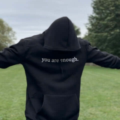 Avöppnad hoodie som visar det sköna innerfoder