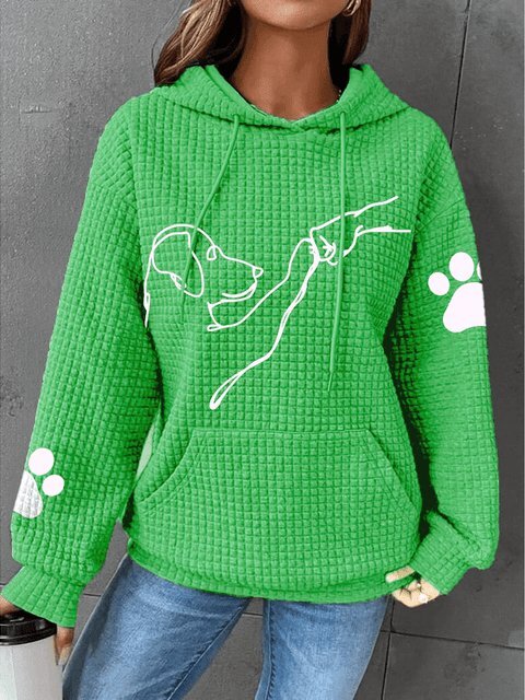 Grön damhoodie med våfflad textur och vitt hundtryck