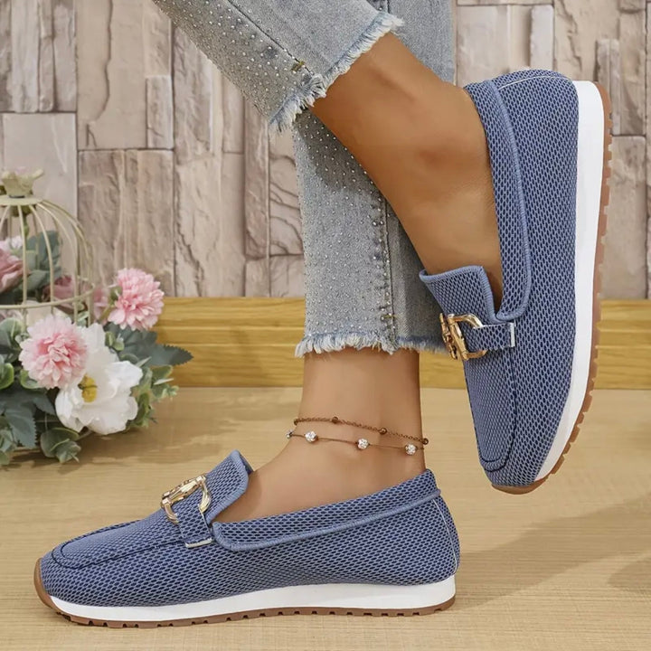 Sida av blå Marie sneakers för dam med mönstrad sula