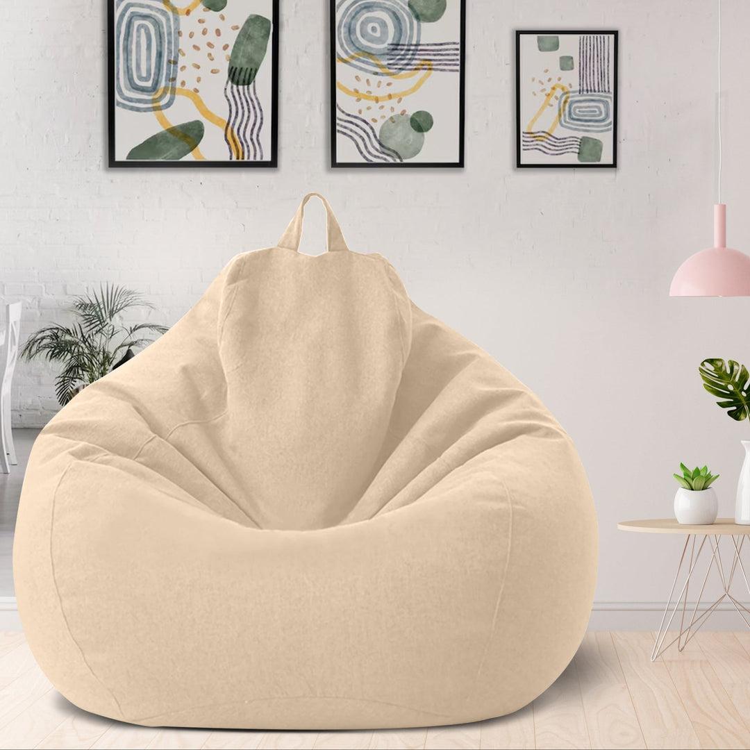 Ergonomisk sittpuff klädd i elegant överdrag placerad i mysig läshörna