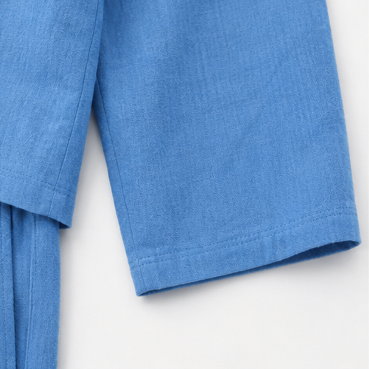 Grå klassisk kavaj med tillhörande bermudashorts i ett bekvämt damset