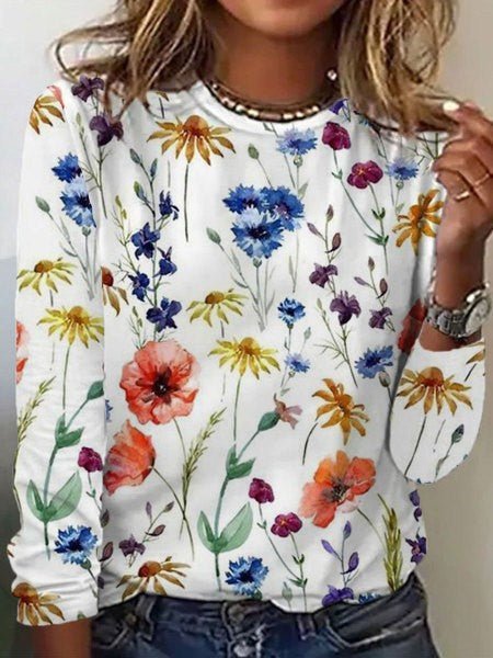 Damtröja med långa ärmar och färgglatt blommönster i vitt