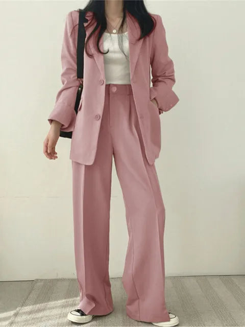 Elegant svart blazer med knäppning från damkostym