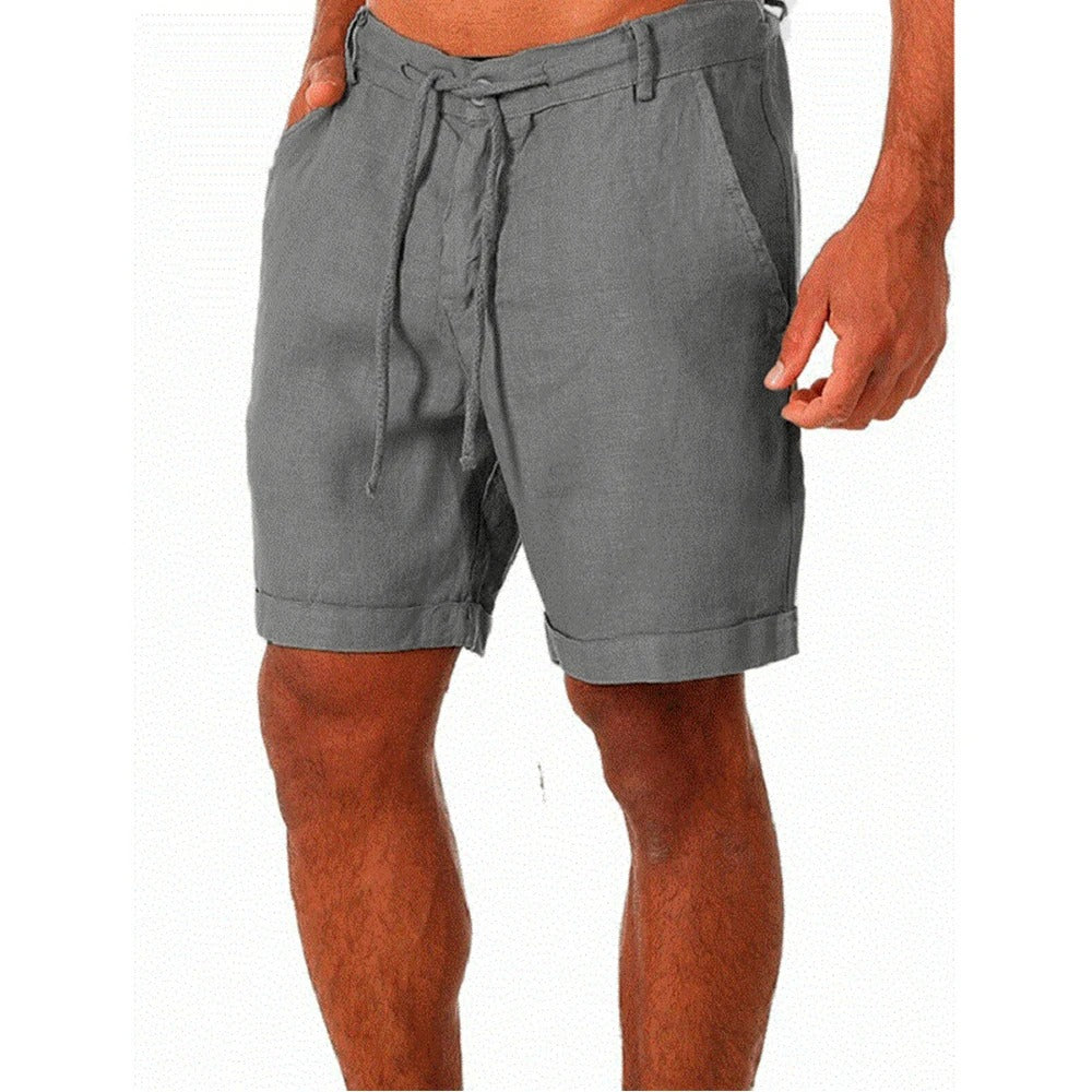 Närbild på tyget och ficka på stilrena sommarshorts för män
