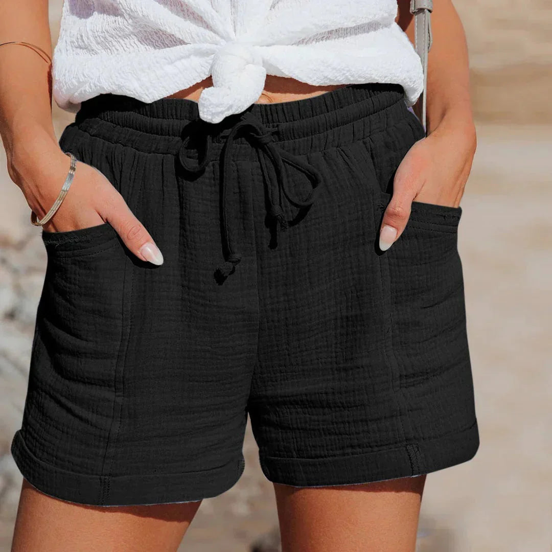 Snygga svarta damshorts med elastisk midja och praktiska fickor