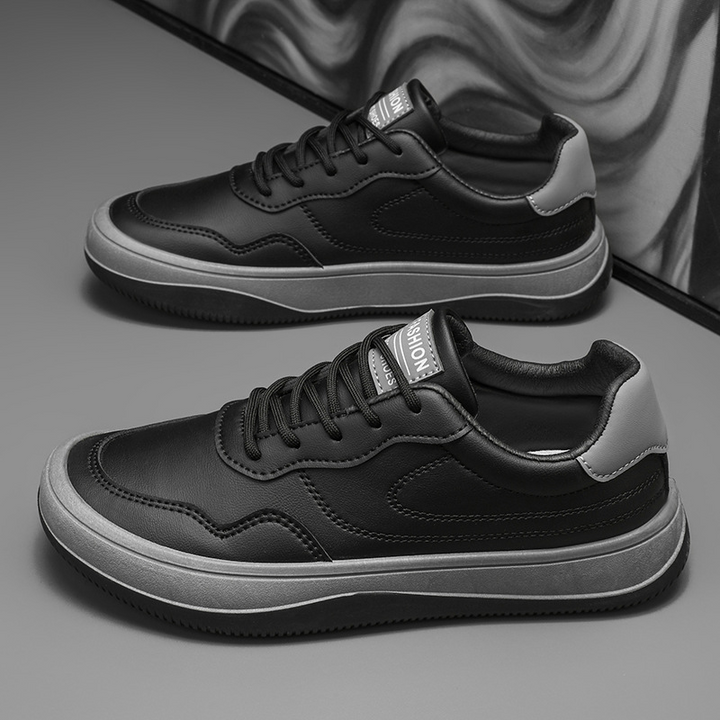 Högkvalitativa vita sneakers för herr med svarta detaljer
