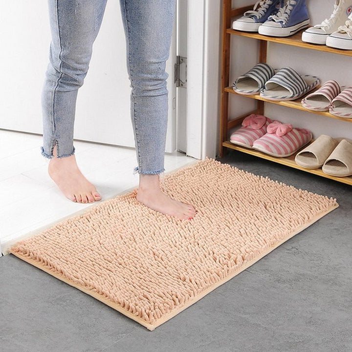 Vikbar och flexibel absorberande badrumsmatta i mjukt material