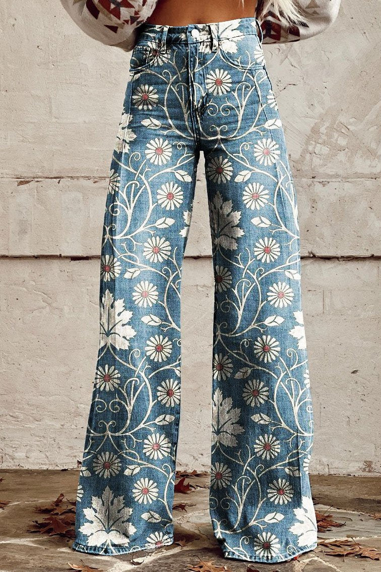 Damvida blommiga jeans i blå färg med bohemiskt mönster