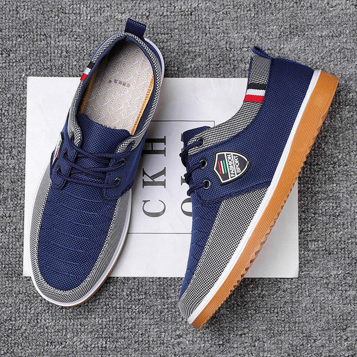 Grå sneakers för herrar med flexibel sula och bra fotstöd