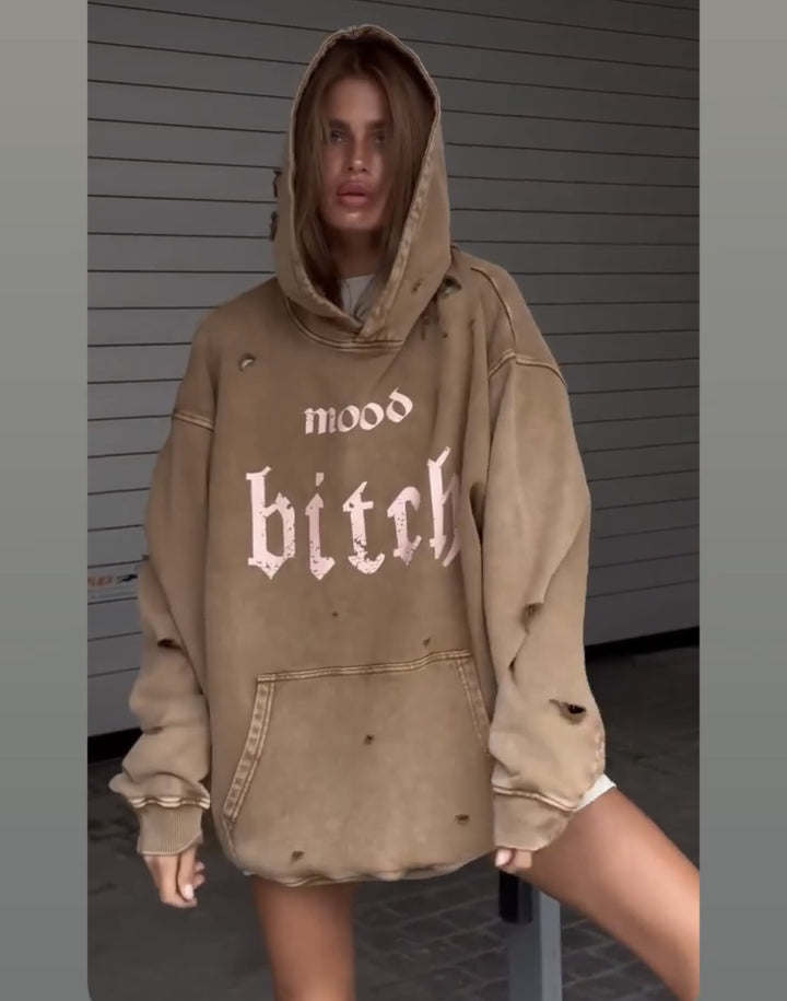 Sliten damhoodie med relaxed fit och skön vintagekänsla