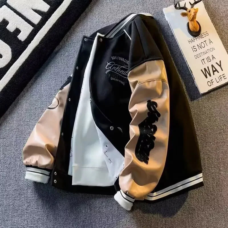 Svart herrjacka i modern streetwear-stil med knappar