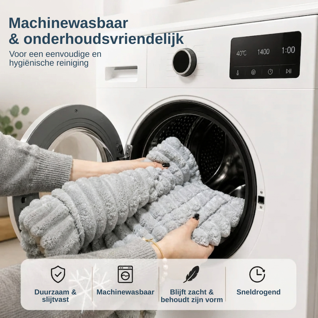 Närbild på det quiltade tyget på det skyddande sofföverdraget