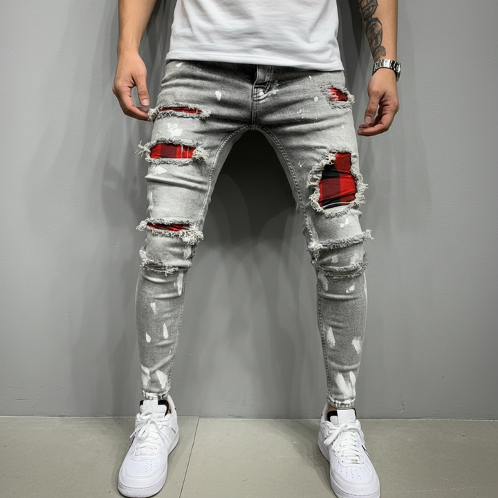 Herrjeans i slim fit modell med coola slitningar bakifrån
