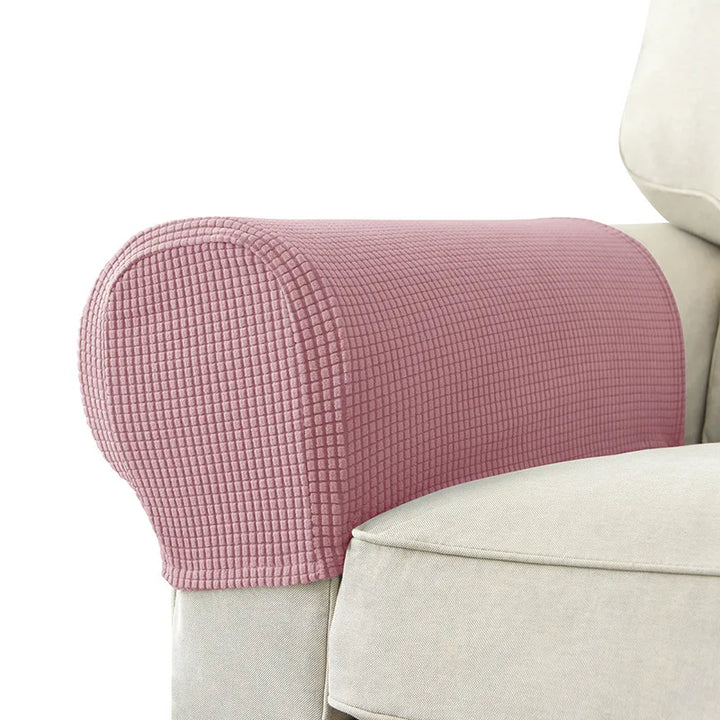 Rosa pulverfärgat armstödsskydd med jacquardmönster på soffa