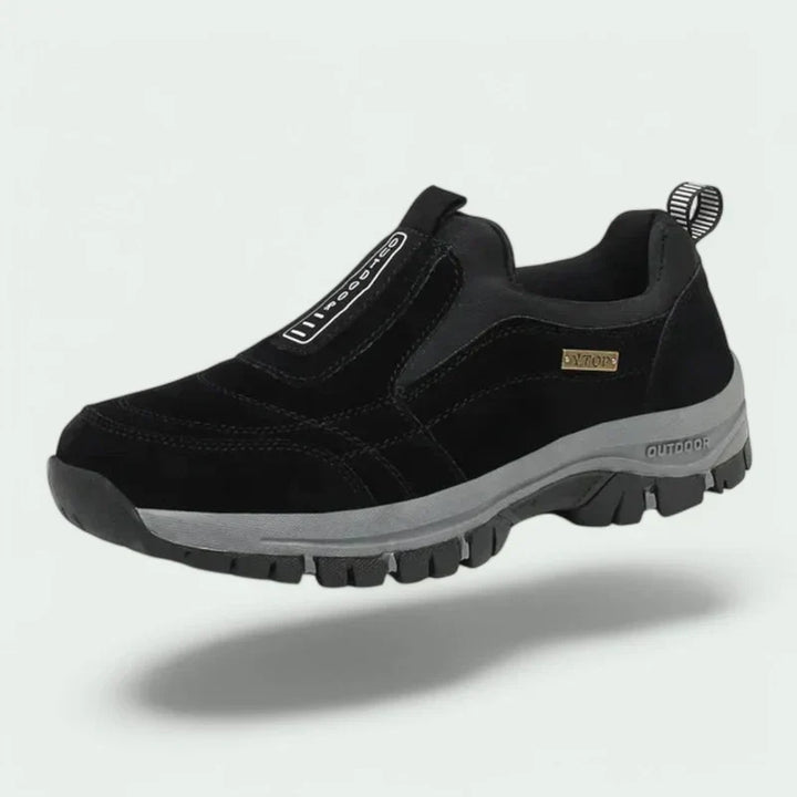Svarta slip-on-sneakers med flexibel passform och greppvänlig sula