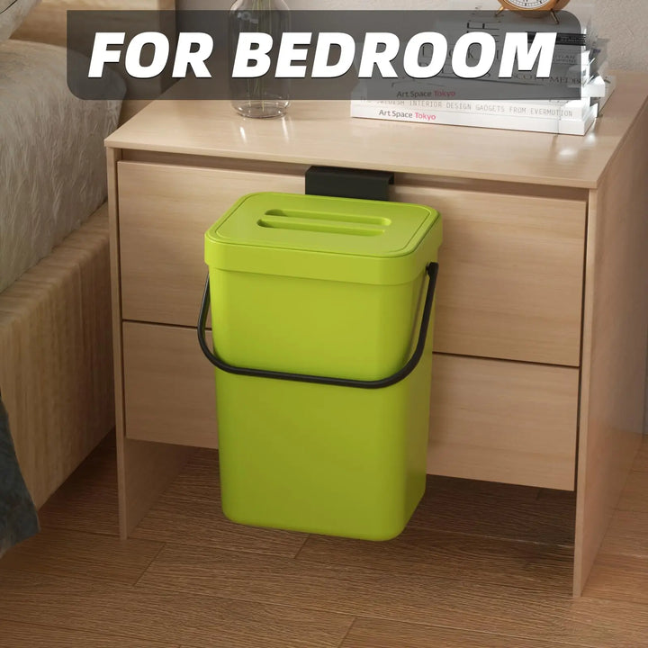 Mini soptunna i stilren design placerad på bänkskiva i köket