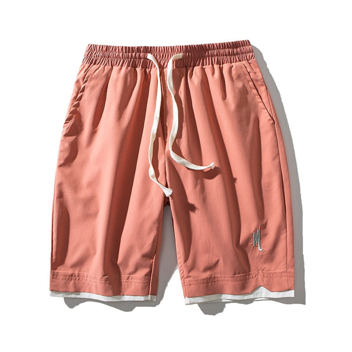 Röda orangeröda herrshorts Dante med dragsko i midjan och broderad detalj på benet