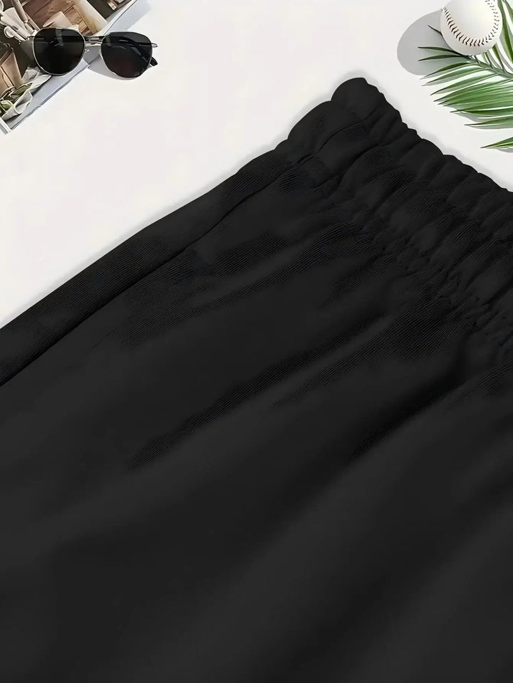 Snygga damshorts i svart med hög midja och skön passform för varma sommardagar