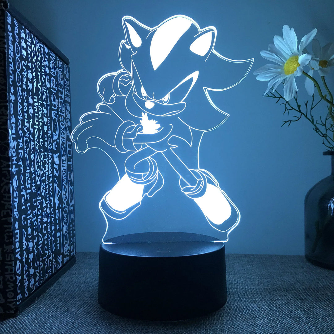 Sonic LED-lampa i mörkblå nyans på skrivbord