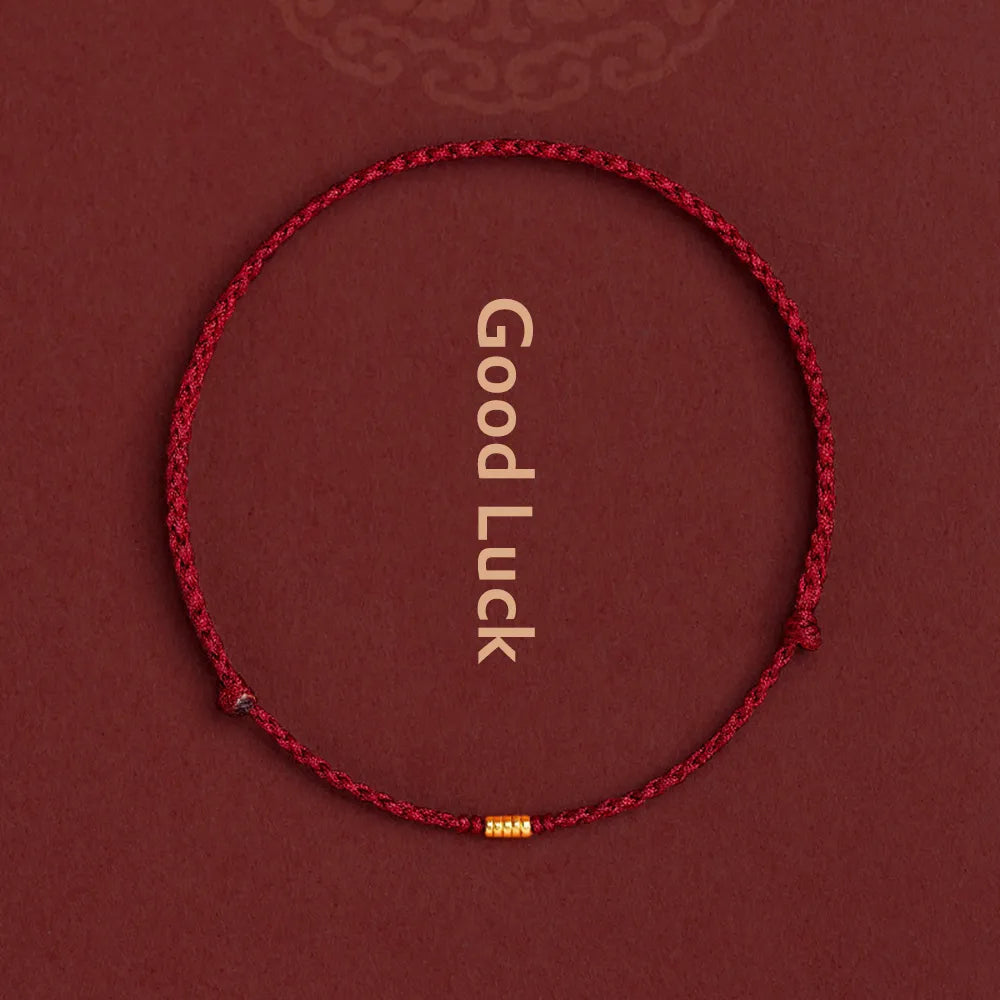 Rött Kabbalah skyddsbead armband med guldfärgade detaljer