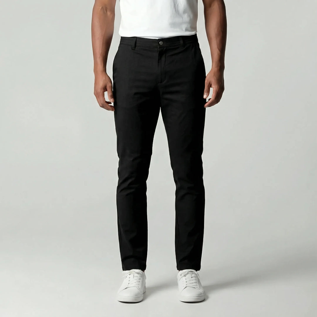 Mörkblå avsmalnande herrbyxor i slim fit stil för en modern och elegant look
