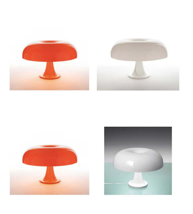 Designlampa tänd i ett mörkt sovrum för stämningsfull atmosfär
