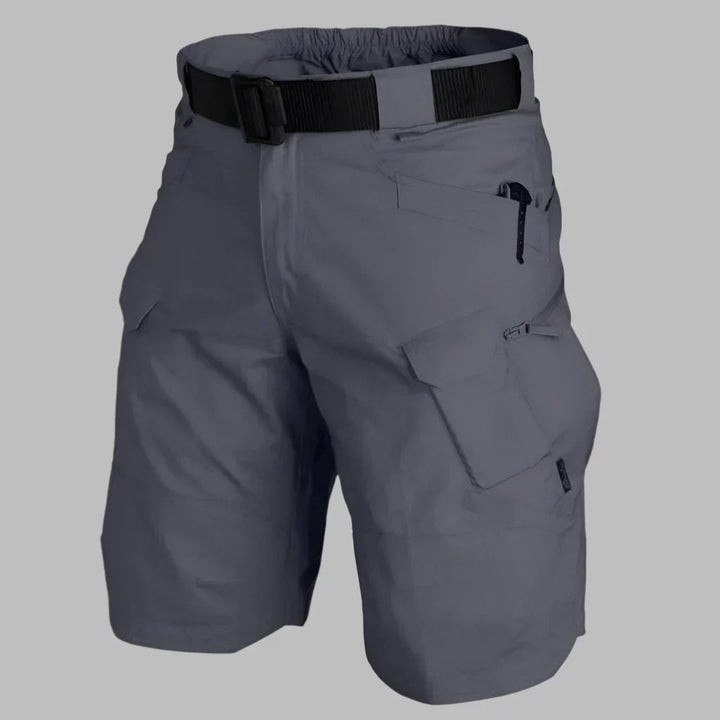 Närbild på tyg och knäppning på dam cargoshorts för vår och sommar