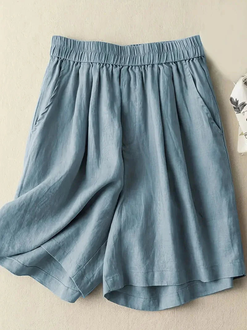 Närbild på ficka och söm på sommarshorts för dam