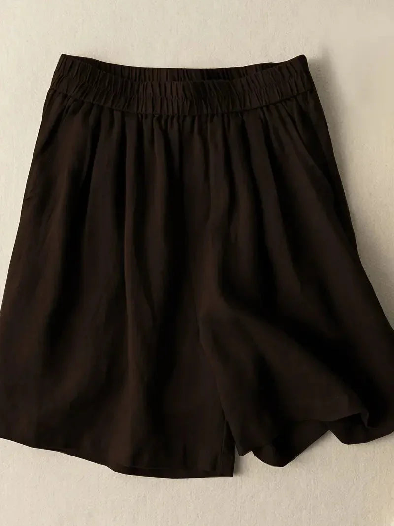 Brun damshorts med elastisk midja och sidofickor
