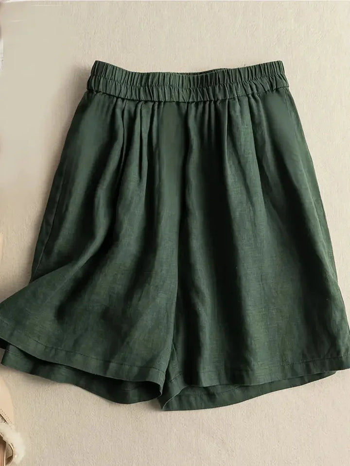 Bekväma linneshorts för dam med hög midja och fickor framtill