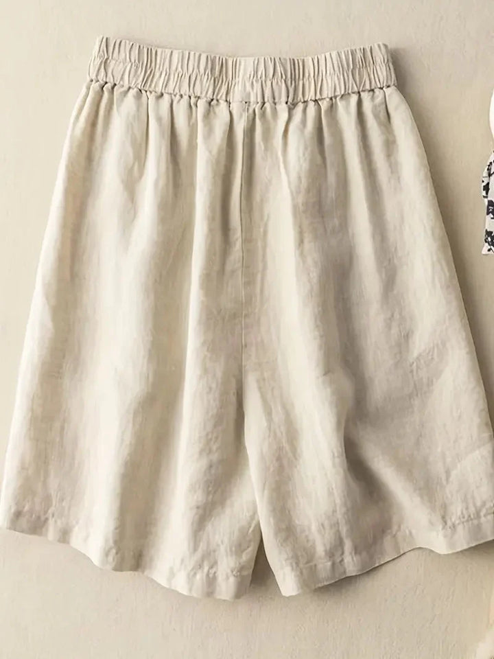 Moderna dam sommarkläder shorts i ljus nyans med resår i midjan