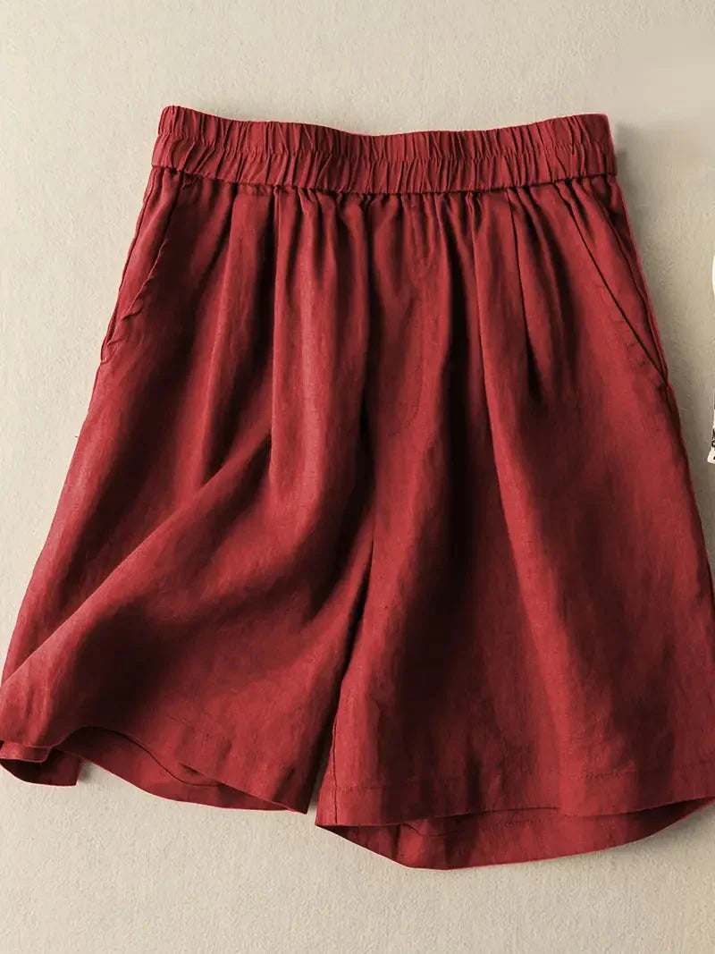 Detaljbild på elastisk midja och tygstruktur på damshorts