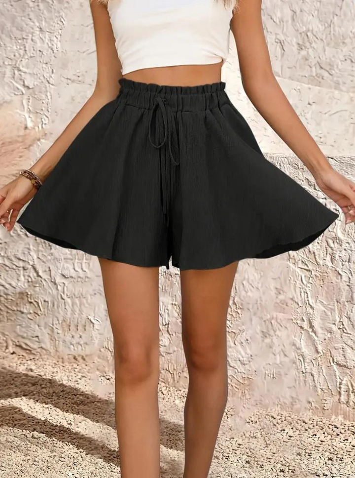 Dam sommarshorts med hög midja och elastisk passform framifrån