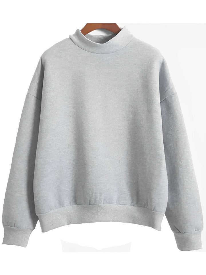 Grå mjuk sweatshirt för damer på klädhängare