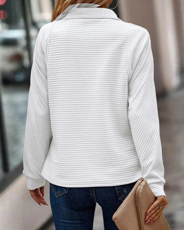 Stilren sweatshirt med V-ringning och dragkedja för dammode