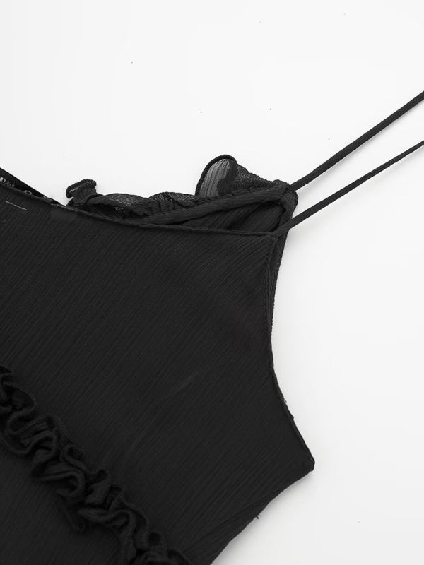 Svart camisole med axelband och dekorativ kant