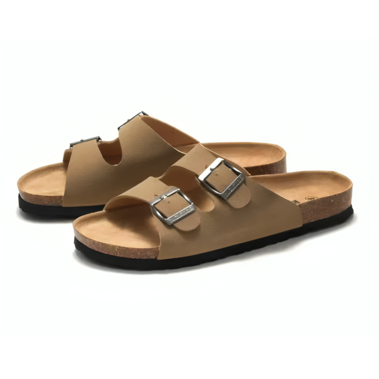 Beige sandaler med korkbotten och dubbla remmar på vit bakgrund