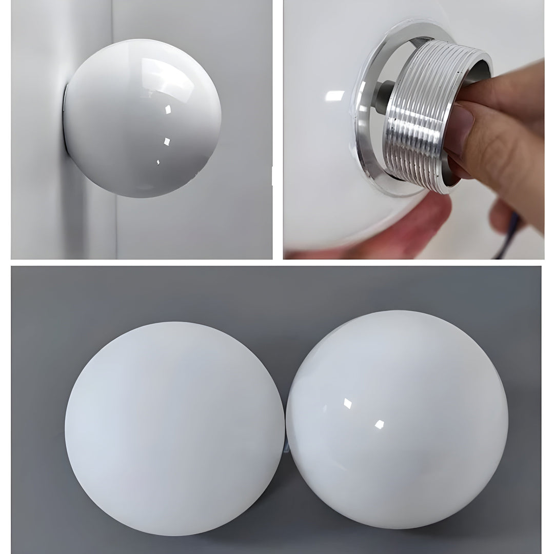 Minimalistisk designlampa i glas mot ljus vägg