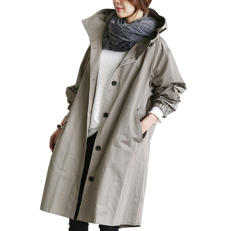 Elegant grå vattentät damjacka och trenchcoat med huva
