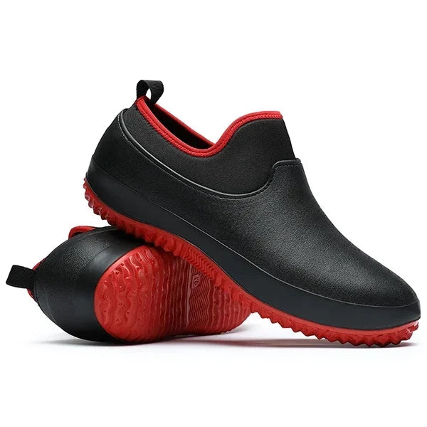 Vattentäta slip-on arbetskor i svart och röd färg