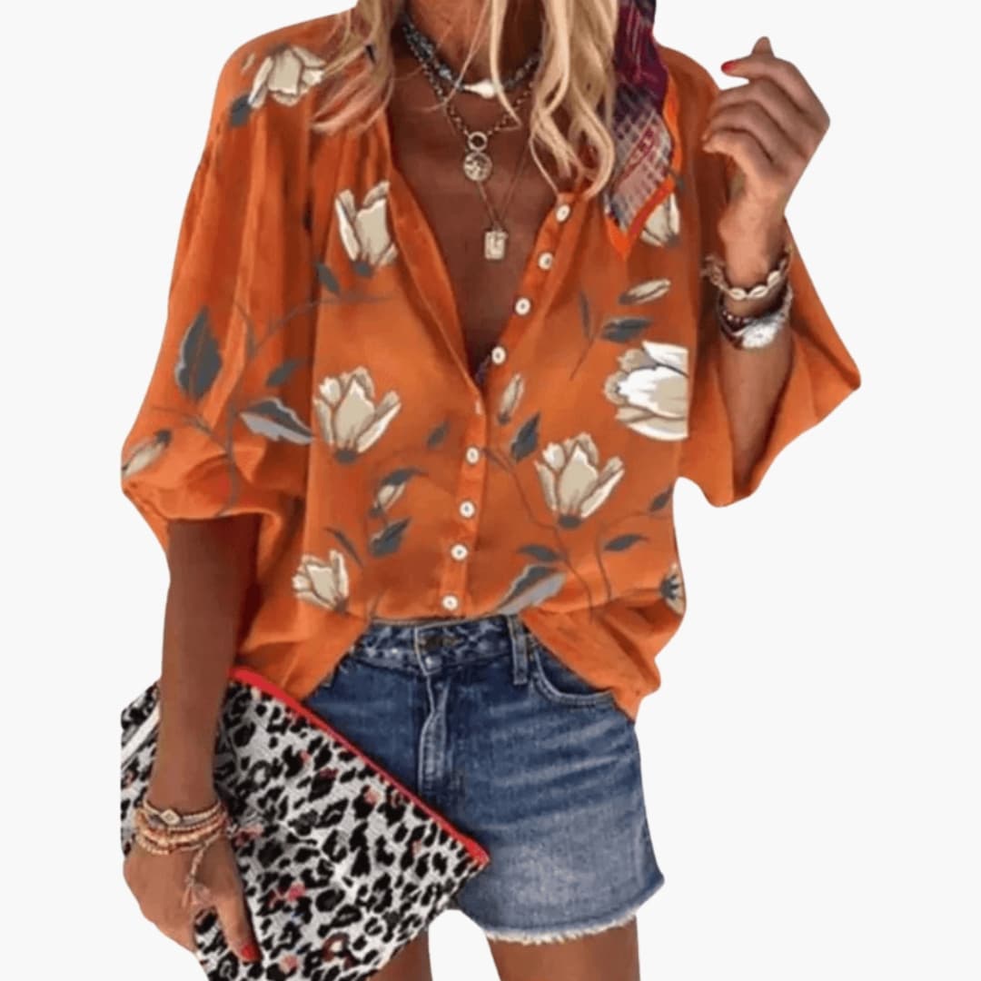 Damkläder - Orange blus med blommigt tryck