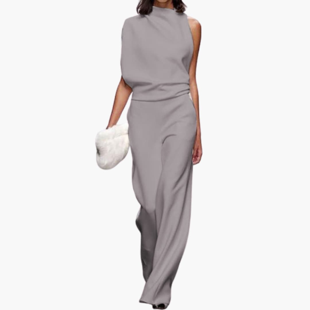 Mörkgrå damjumpsuit med rund halsringning och elegant passform.