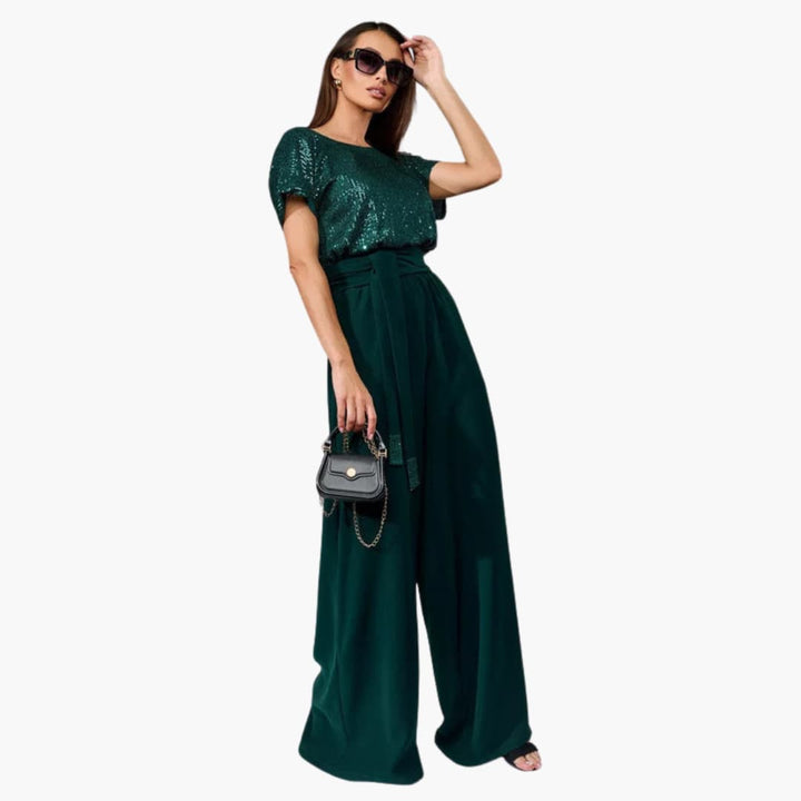 Elegant damjumpsuit med paljetter och vida ben bakifrån för fest och mode