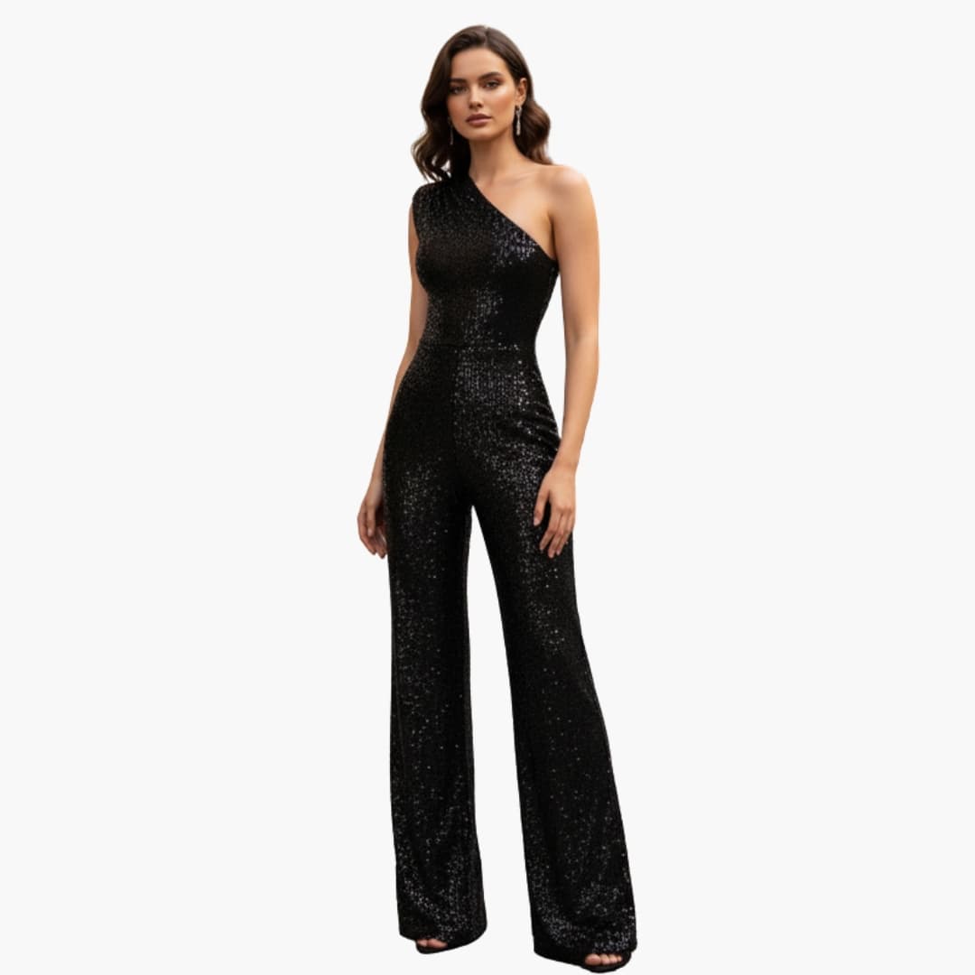 Kvinna som bär en svart ärmlös paljettjumpsuit med raka ben