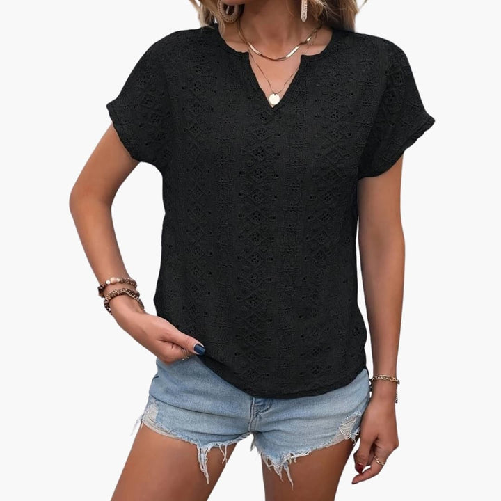 Svart dam t-shirt med korta ärmar och mönstrat broderi