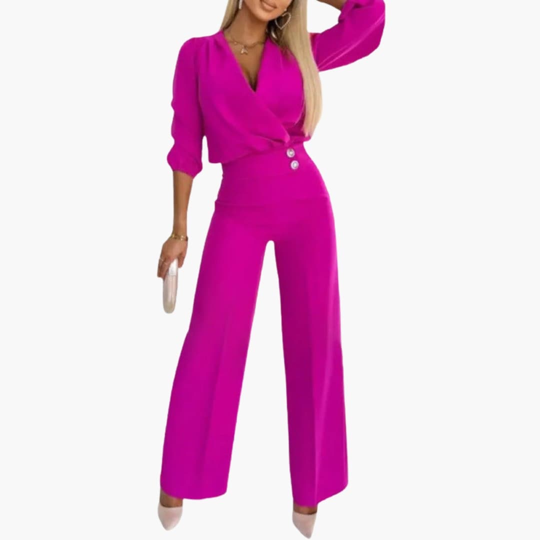 Detaljbild på elegant dam jumpsuit med v-ringad design och puffärm