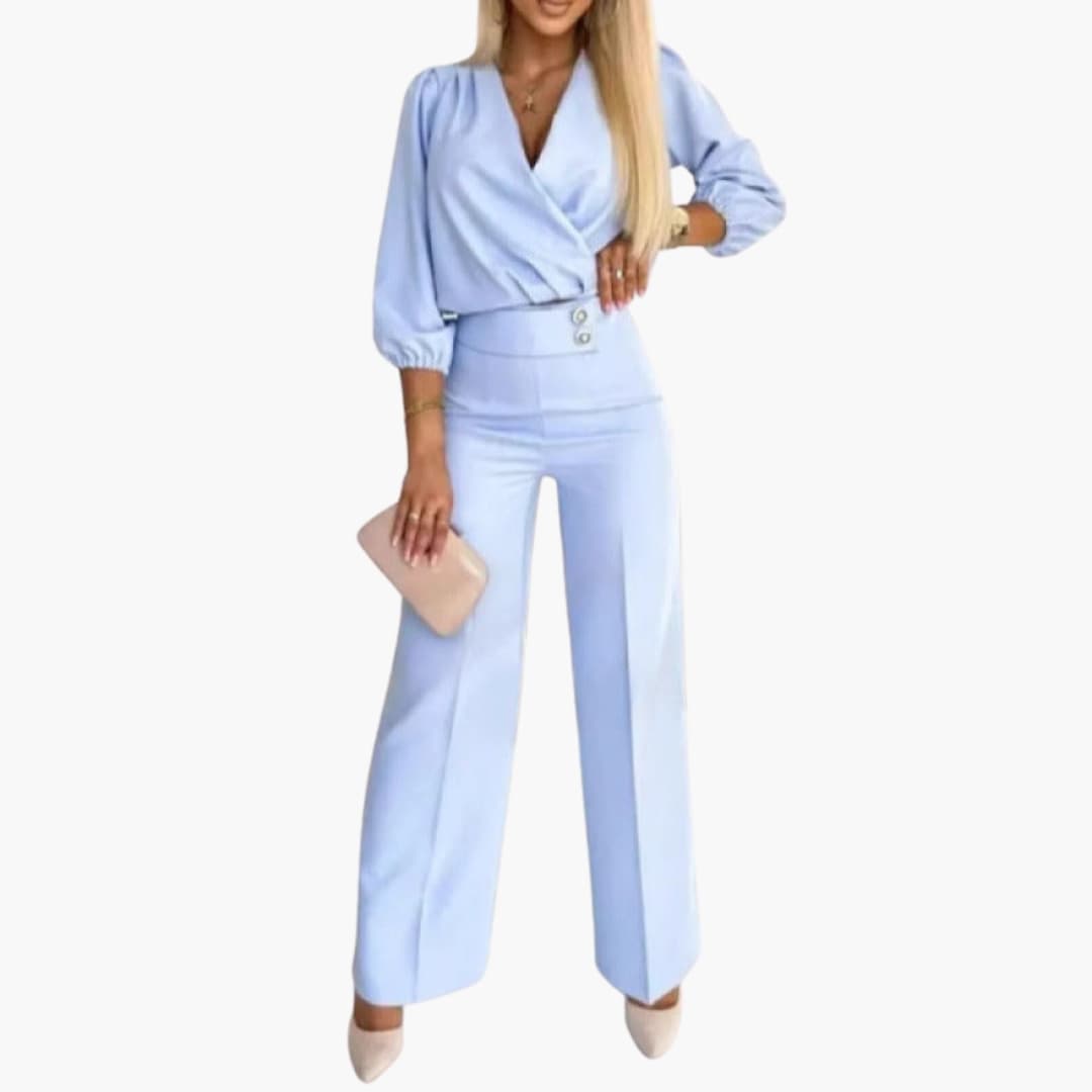 Ljusblå damjumpsuit med V-ringning och vida ben