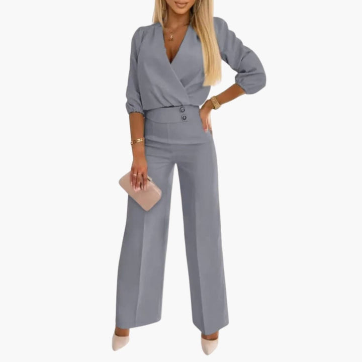 Modern jumpsuit med korta puffärmar och kvinnlig silhuett för dam
