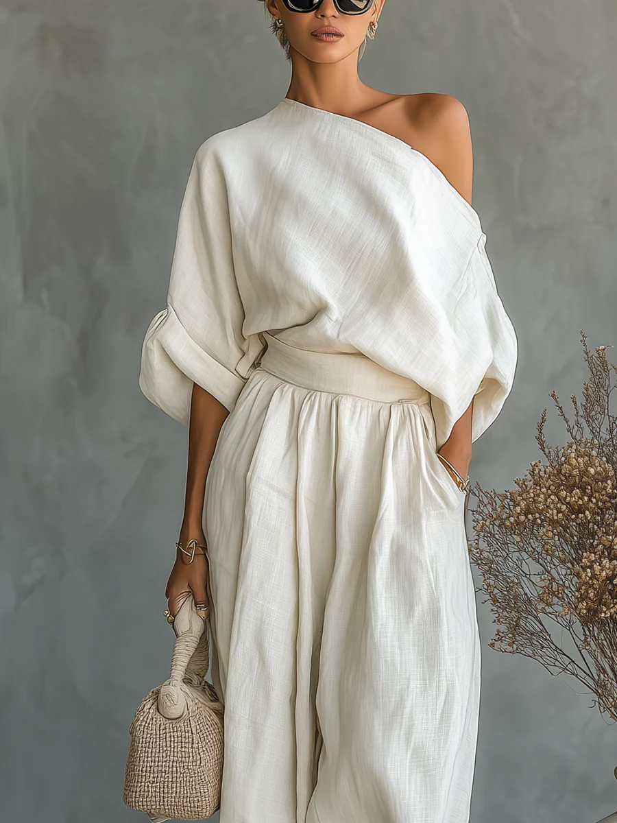Närbild på off-shoulder tröja och midja