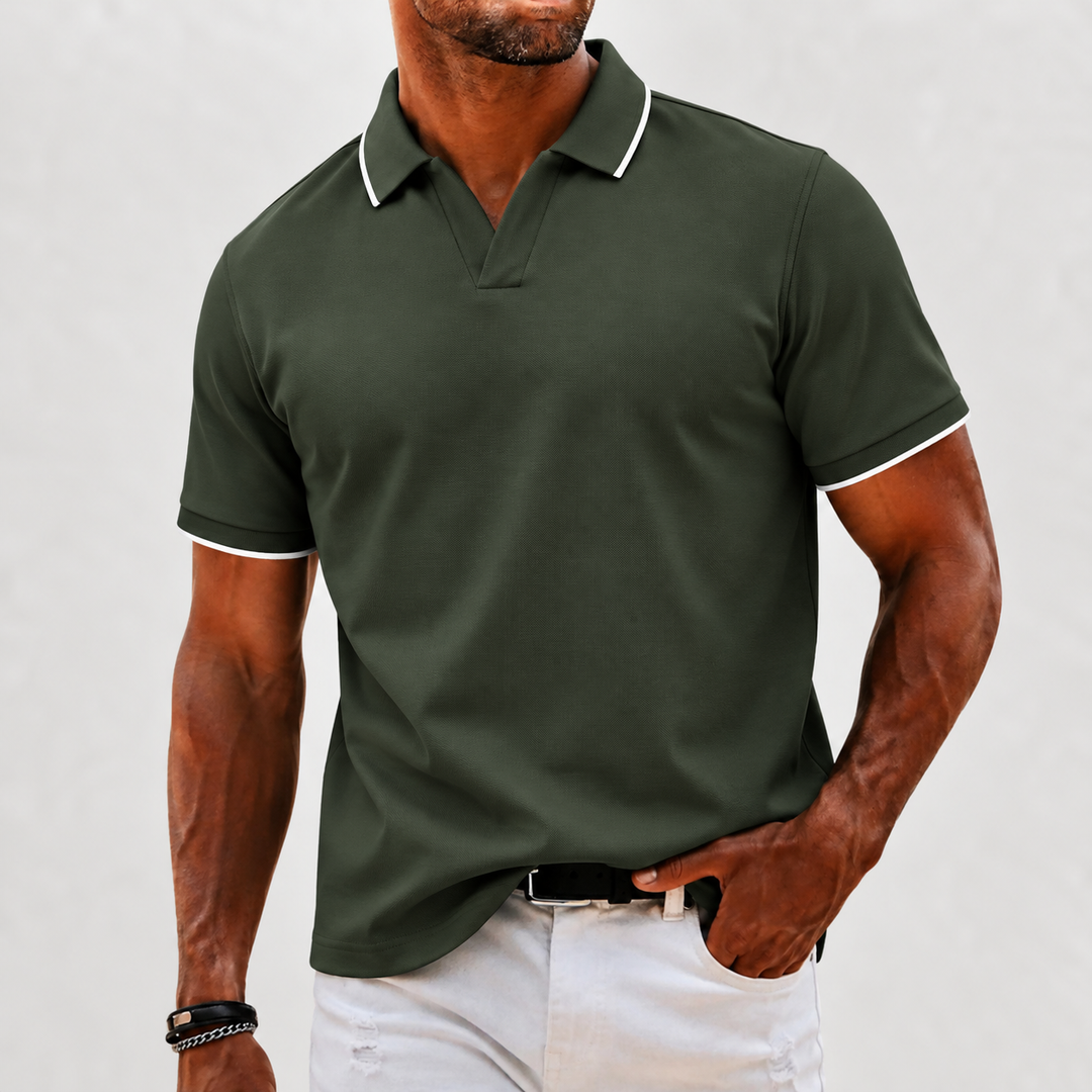 Klassisk kortärmad stickad polo för herr i stilren design med mönstrad krage